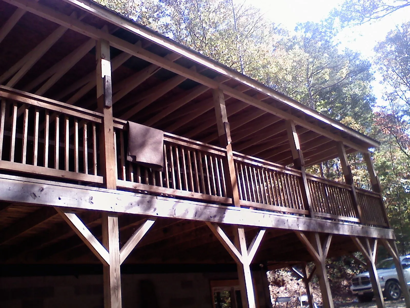 Timber framing under a new elevated porch and deck — Roof Leak Repair in Cosmopolis by Roofing Brothers